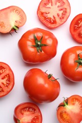 Ripe red tomatoes on white background, flat lay