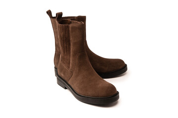 Brown leather boots isolated on white background.