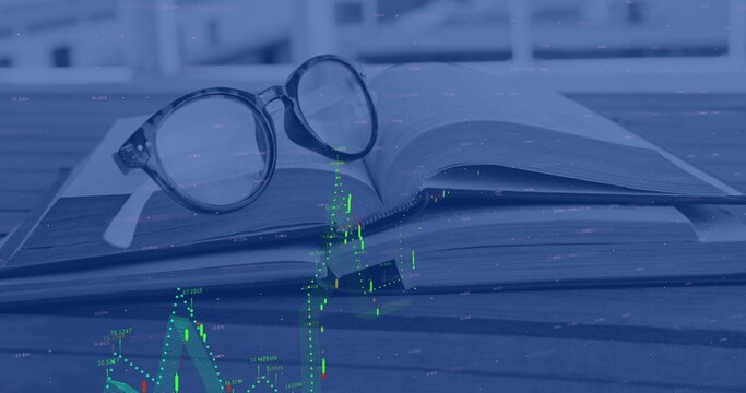 Resting eyeglasses on open book in stack on wooden desk near window, with candlestick chart overlay