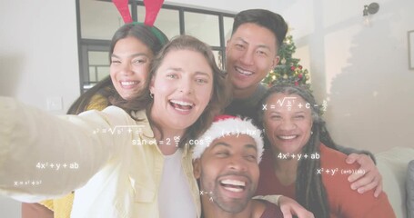 Central woman raising smartphone starting tech selfie for fun, friends posing under math overlays