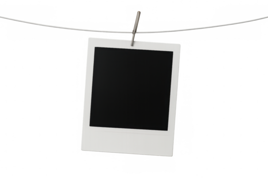 Instant frame hanging with a paper clip on a clothesline, ready for filling with memories and moments, transparent background