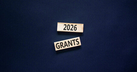 2026 Grants symbol. Concept words 2026 Grants on beautiful wooden blocks. Beautiful black paper background. Business and 2026 grants concept. Copy space.