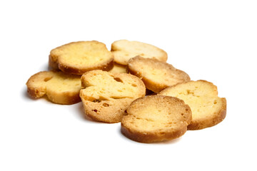 Assorted golden-brown cookies stacked on a white background, showcasing their crunchy texture and inviting appearance, perfect for dessert or snack ideas