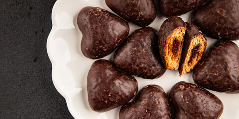 Gingerbread chocolate heart shaped honey cakes Christmas sweet dessert new year natural product tasty snack fresh delicious gourmet food background on the table rustic top view copy space