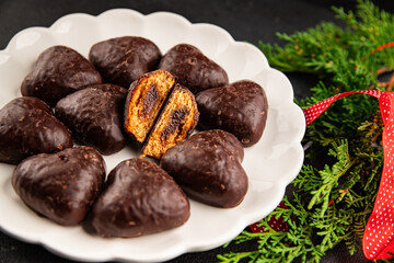 Gingerbread chocolate heart shaped honey cakes Christmas sweet dessert new year natural product tasty snack fresh delicious gourmet food background on the table rustic top view copy space