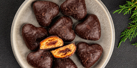 Gingerbread chocolate heart shaped honey cakes Christmas sweet dessert new year natural product tasty snack fresh delicious gourmet food background on the table rustic top view copy space