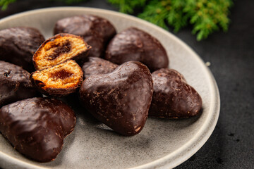 Gingerbread chocolate heart shaped honey cakes Christmas sweet dessert new year natural product tasty snack fresh delicious gourmet food background on the table rustic top view copy space