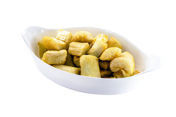 portion of fried cassava in white glass bowl, typical Brazilian food, fried cassava root served hot, white background