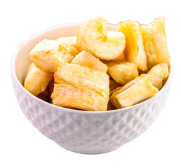 portion of fried cassava in white glass bowl, typical Brazilian food, fried cassava root served hot, white background