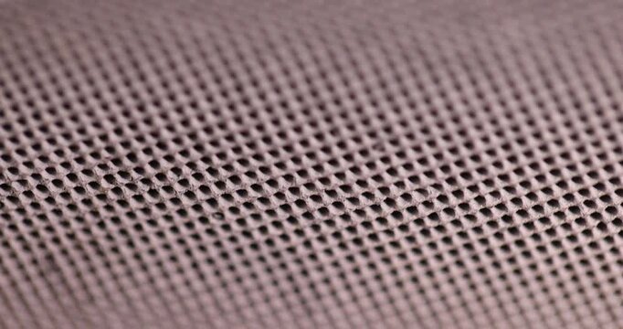 parts of an old ceramic catalyst made of modern ceramic materials, which has been used for a long time and has various damages, old ceramic catalyst with holes