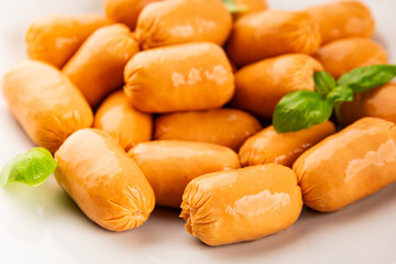 Sausage mini meat portion size fast food natural product tasty snack fresh delicious gourmet food background on table rustic top view copy space