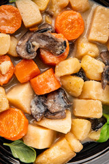 Potato stew mushrooms and vegetables natural tasty snack fresh delicious gourmet food background on the table rustic top view copy space keto and paleo diet vegerian and vegan food