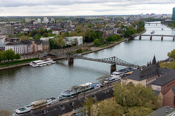 Obraz premium Frankfurt, Germany- April 18, 2025: Aerial viewpoint over Frankfurt Main river