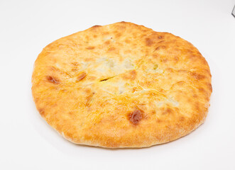 Golden Baked Georgian Kubdari With Flaky Crust And Meat Filling On White Plate