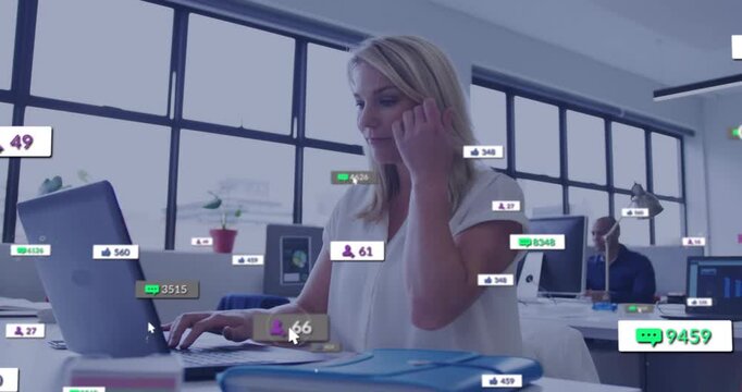 Woman typing on laptop initiating floating follower like icons for tracking social media engagement
