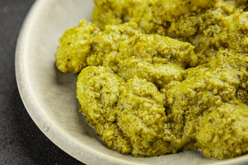 Gnocchi pesto sauce green tasty snack fresh gourmet food background on the table rustic top view copy space vegerian and vegan food