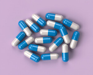 Blue and white capsules offering relief and hope for better health, showcasing pharmaceutical innovation and medical solutions on a calming lavender backdrop