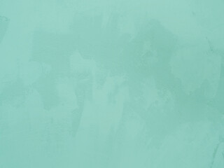 Teal background with abstract lime wash effect for social media, website and marketing, light pastel green turquoise structured, rustic surface, space for copy text, backdrop for creative concept