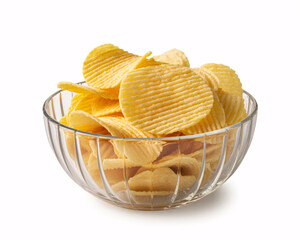 Crispy golden potato chips in a clear glass bowl, perfect for snack time, parties, or advertising delicious treats