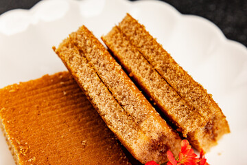 Biscuit cake portion filling jam sweet dessert cake natural product tasty snack fresh delicious gourmet food background on the table rustic top view copy space
