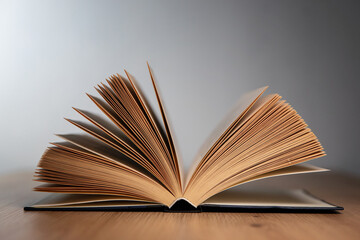 Open Book on Wooden Table
