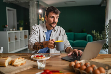 Man working from home having coffee and breakfast