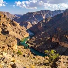 Deep canyon with river winding through, viewed from elevated vantage