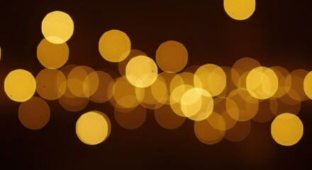 Abstract Golden Bokeh Lights on Dark Background Creating a Festive Atmosphere.