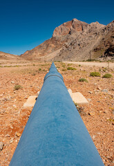 A water pipeline transporting life-giving water form the Orange River through the barren Richtersveld in the Northern Cape of South Africa