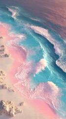 Aerial view of a pastel beach with pink sand, turquoise waves, and blue water