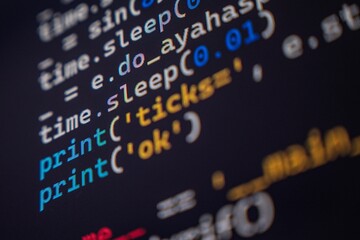 A detailed view of programming code displayed on a computer screen, showcasing various commands and functions in a colorful text editor.