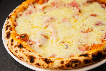 Pizza ham, cheese, tomato sauce fast food natural product tasty snack fresh delicious gourmet food background on the table rustic top view copy space