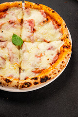 Pizza ham, cheese, tomato sauce fast food natural product tasty snack fresh delicious gourmet food background on the table rustic top view copy space