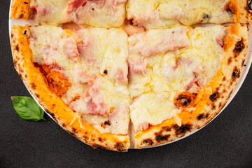 Pizza ham, cheese, tomato sauce fast food natural product tasty snack fresh delicious gourmet food background on the table rustic top view copy space