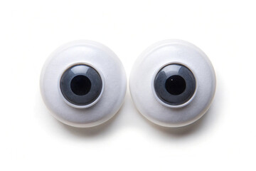 Three rolls of toilet paper are isolated on a clean white background, showcasing their soft, textured surfaces.