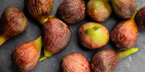 Figs fresh ripe fruit natural product tasty snack fresh delicious gourmet food background on the table rustic top view copy space diet vegan and vegan food
