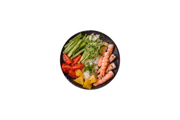 A prawn or shrimp bowl with rice, tomatoes, sauce, and vegetables, Asian food. Prawn or shrimp