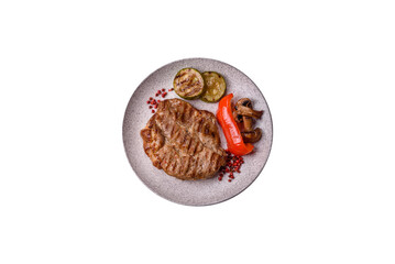 Grilled beef or pork steak, healthy restaurant food for lunch. Barbecue steak as a background
