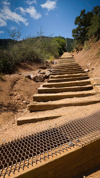 Manitou Incline stairway with wood steps leading to the top of a mountain