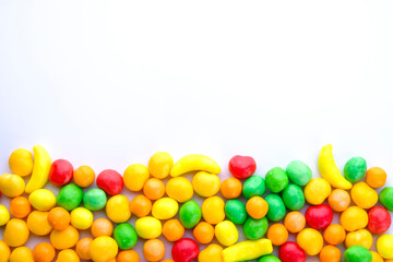background of colorful fruit candies with copy space