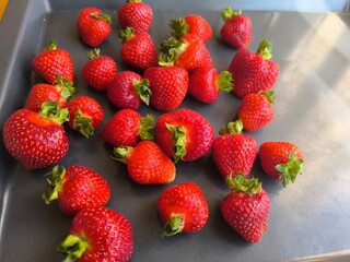 Fresh ripe red strawberries. Organic farm berries. Vegetarian, vegan and raw food concept.