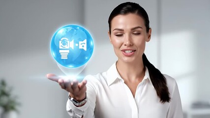 Woman Holding Digital Sphere with Camera Icon in Light Studio Setting Wearing White Blouse and Watch, Smiling Expressively, Business Theme, Modern Studio