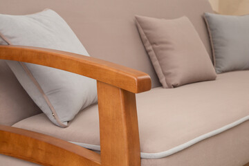 sofa with wooden armrest