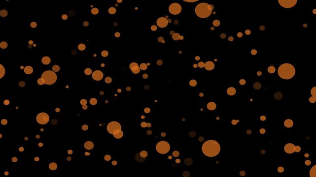 Abstract orange circles floating on black background animated bokeh particles motion graphic