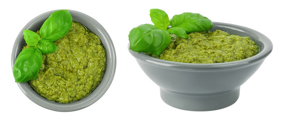 Pesto sauce in ceramic bowl isolated on white background. Top view. Flat lay.