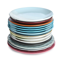 Stack of different ceramic plates isolated on white
