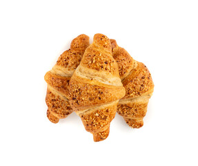 Delicious croissant with nut crumbs, sweet French bakery
