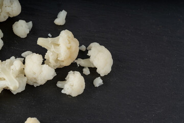 Steamed cauliflower pieces close up