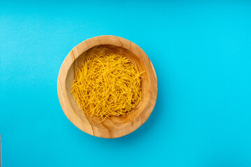 Raw vermicelli, gold soup pasta, small homemade noodles, thin Italy macaroni