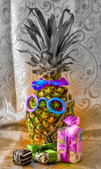 A fresh pineapple is decorated as a funny character with colorful, quirky sunglasses and a costume - art concept for a party, event, celebration, featuring a pineapple with a personality.